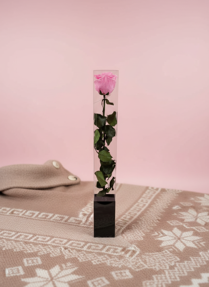 Close-up of rose product with poncho textile details